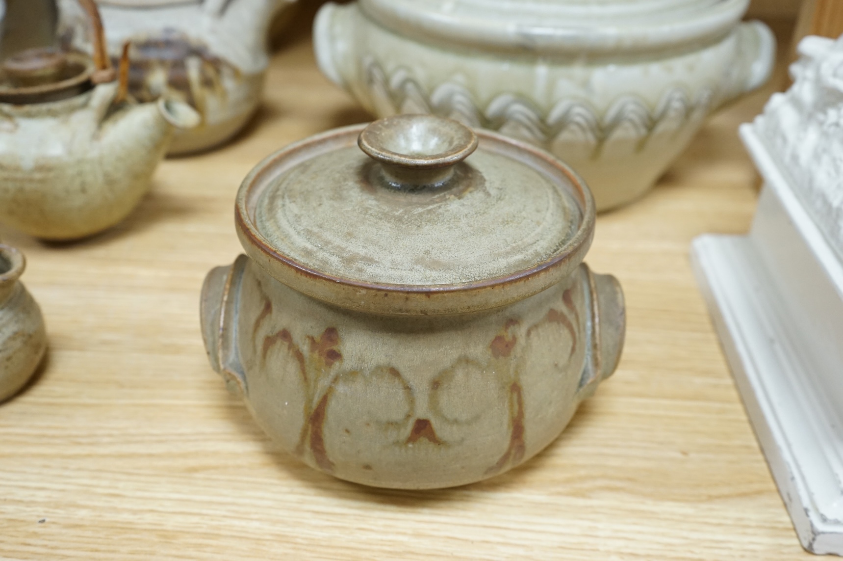 A collection of large Studio pottery vases teapots bowls and tureens (12). Tallest 27cm high